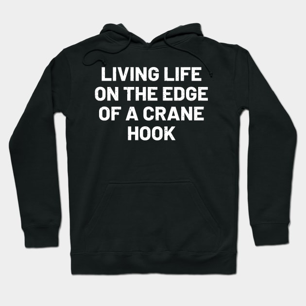 Living life on the edge... of a crane hook Hoodie by trendynoize